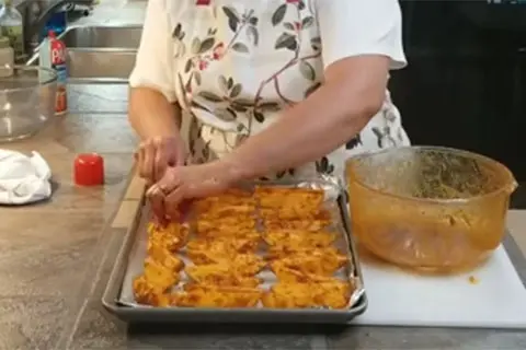 Place the potato wedges on a baking sheet