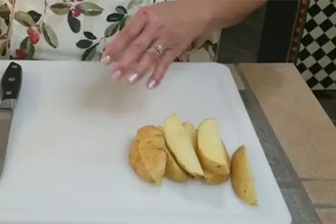 Wash the potatoes and cut them