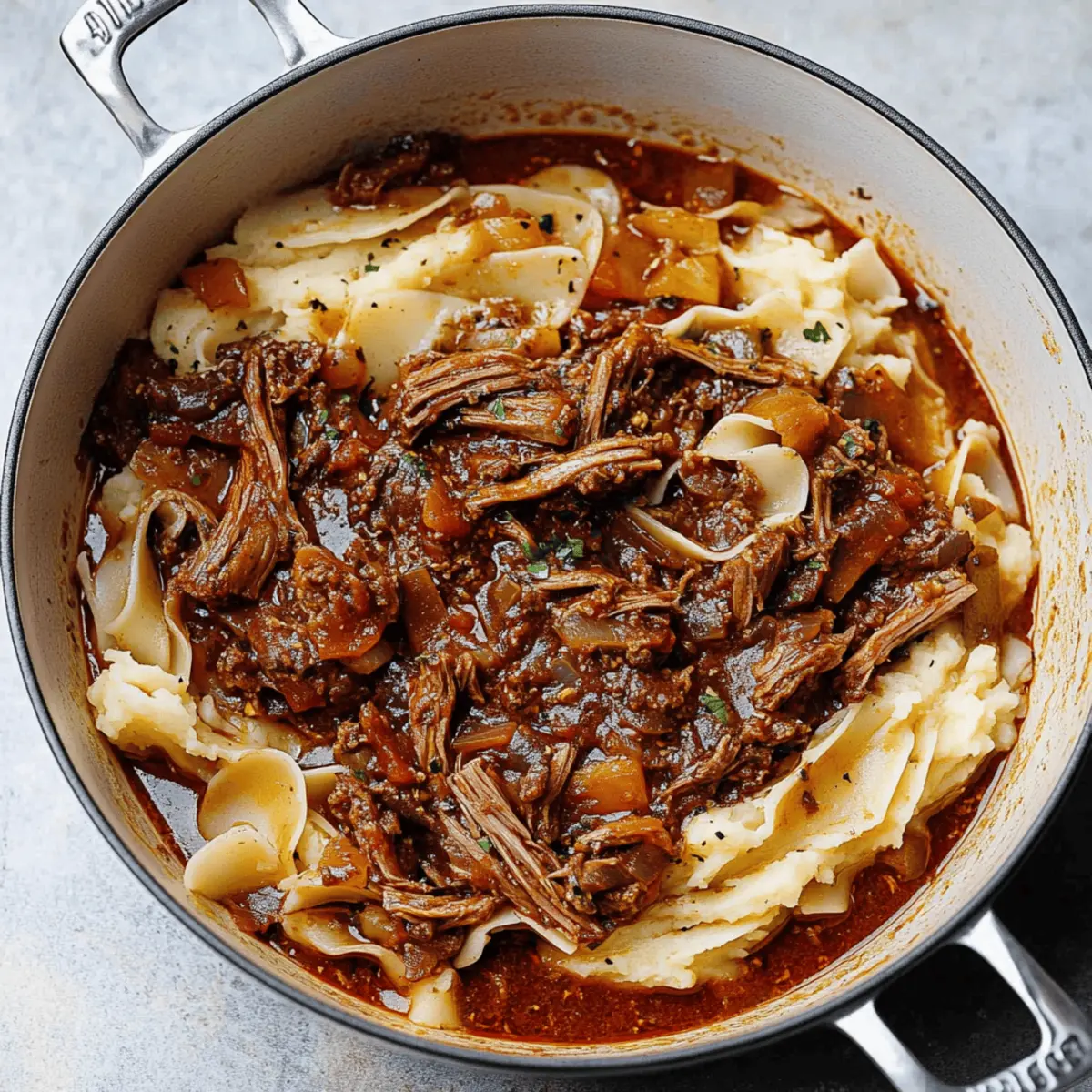 Tender Short Rib Ragu Over Silky Parmesan Mashed Potatoes Recipe