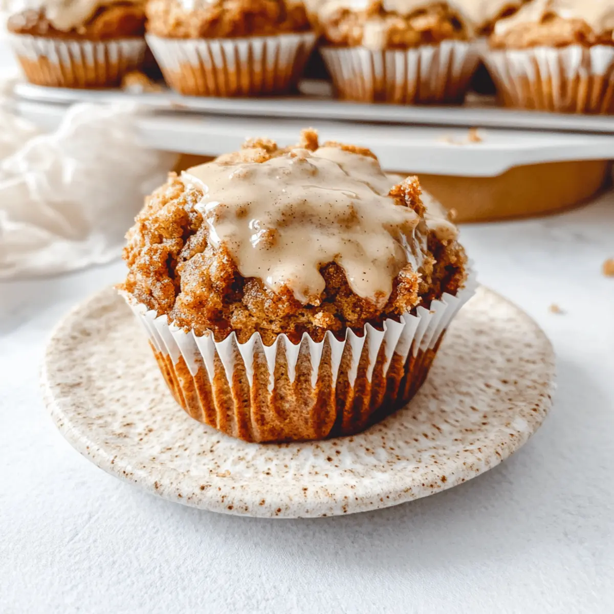 The Best Pumpkin Cinnamon Roll Muffins Ever with Streusel Topping