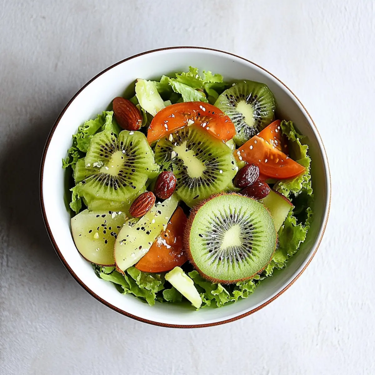 Refreshing Kiwi Salad Bowl for New Year with Persimmon and Walnuts