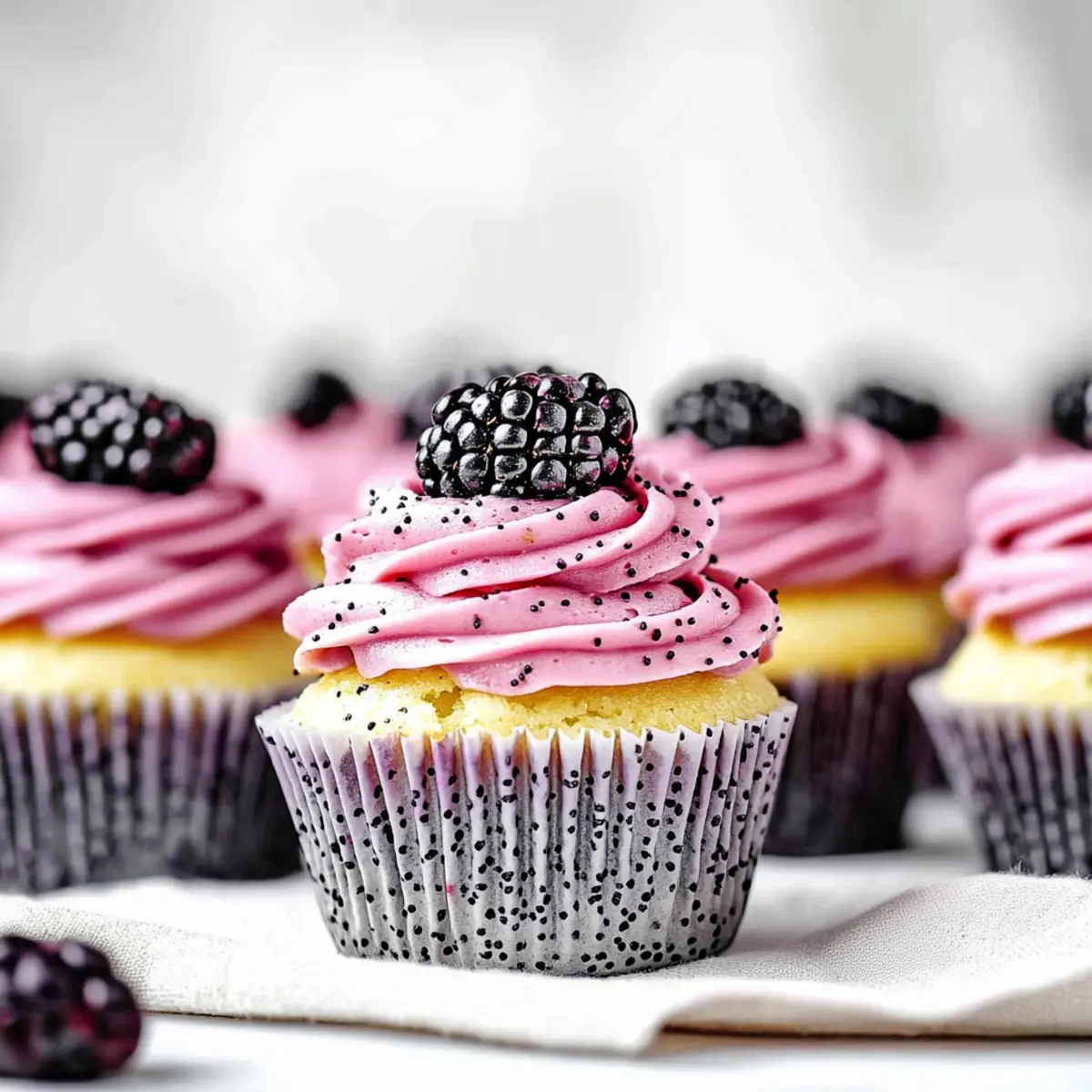 Lemon Poppy Seed Cupcakes with Blackberry Frosting Recipe