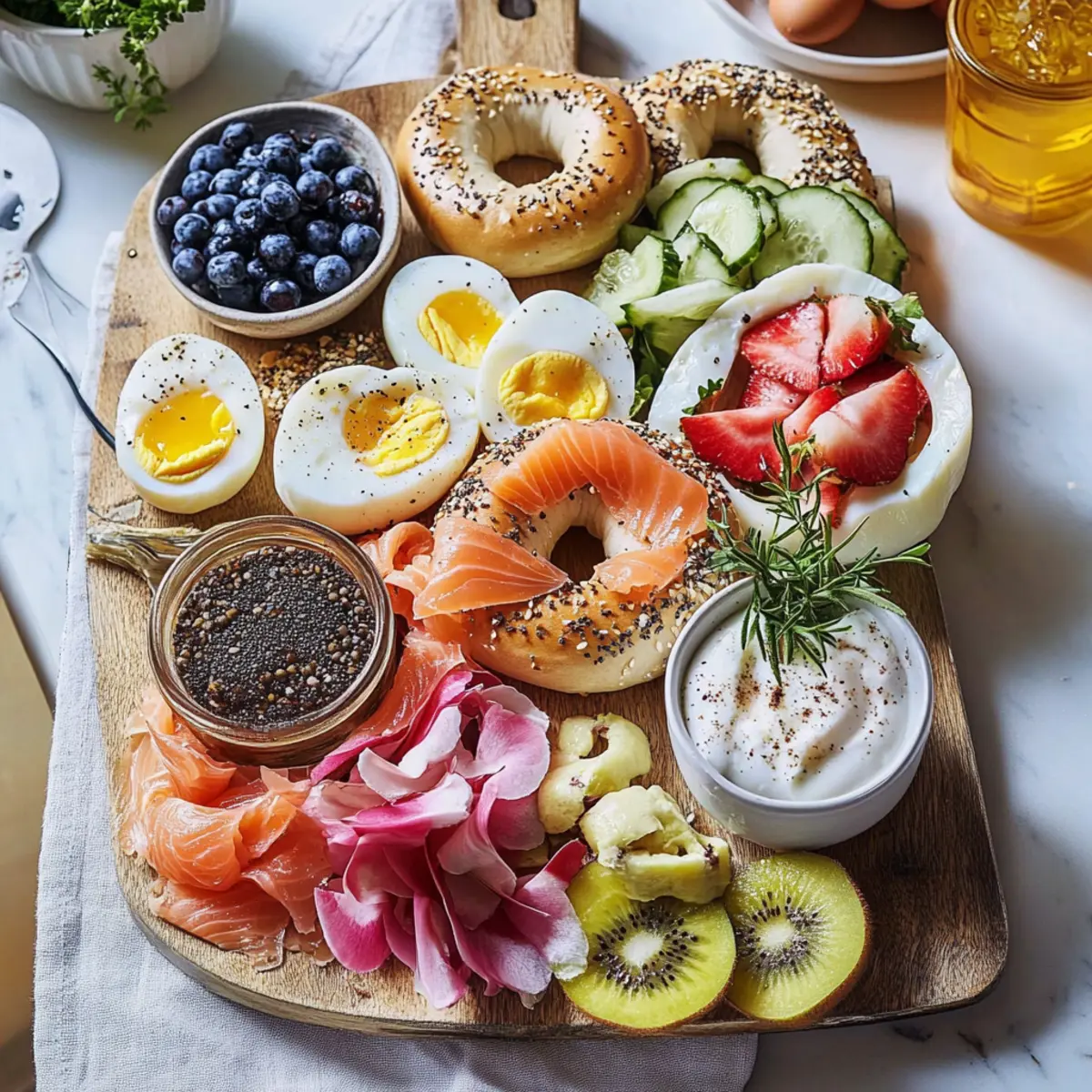 Easy Bagel Bar Brunch with Eggs, Salmon, Fruit & Sweets Recipe
